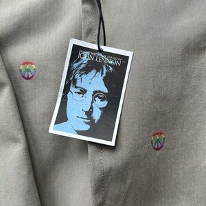John Lennon brand embroidered peace sign jacket. From 2009. Tags still attached
